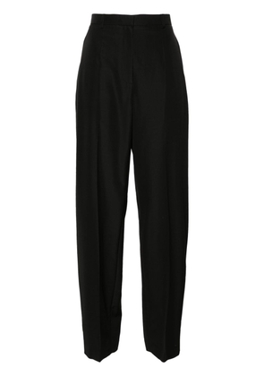 Alexander Wang slit-detail tapered trousers - Black