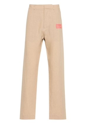 Off-White appliqué-logo tapered trousers - Neutrals