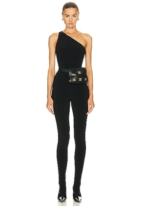 Norma Kamali One Shoulder Footie Catsuit in Black - Black. Size M (also in L, S, XL).