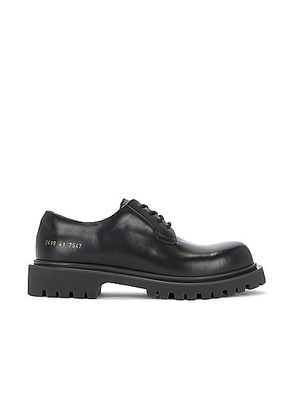 Common Projects Chunky Derby in Black - Black. Size 42 (also in 43).