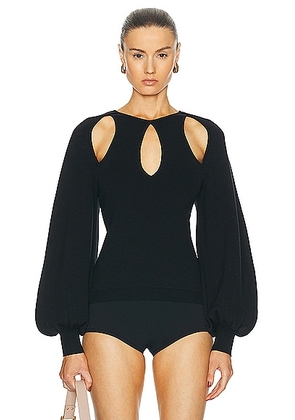 Chloe Long Sleeve Cut Out Top in Black - Black. Size L (also in M, S, XS).