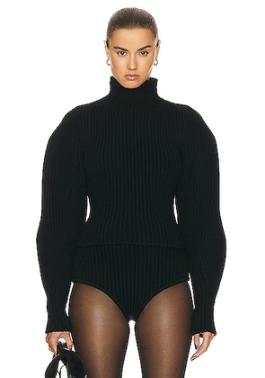 ALAÏA High Neck Sweater in Noir Alaia - Black. Size 40 (also in ).