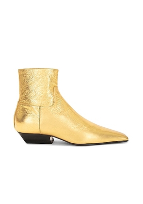 KHAITE Marfa Classic Flat Ankle Boot in Gold - Metallic Gold. Size 36.5 (also in 37, 37.5, 38, 38.5, 39, 39.5, 40).