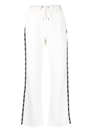 Moncler logo-tape track pants - White