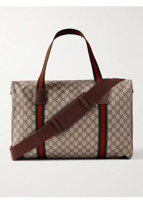 Gucci - Leather- and Webbing-Trimmed Monogrammed Supreme Coated-Canvas Holdall - Men - Neutrals