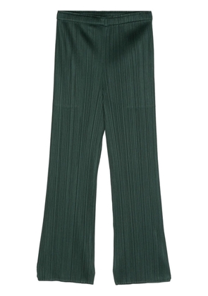 Pleats Please Issey Miyake plissé-effect slim-cut trousers - Green
