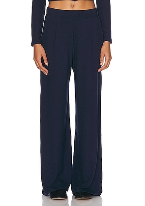 LESET Lauren Pleated Pocket Pant in Navy - Navy. Size L (also in M, S, XL, XS).