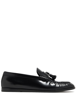 The Row tassel-detailed leather loafers - Black