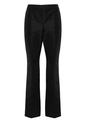 Moschino patch-detail trousers - Black