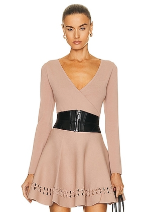 ALAÏA Wrap Angie Bodysuit in Nude - Nude. Size 42 (also in 44).