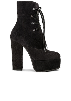 ALAÏA Platform Lace Up Boot in Carbone - Black. Size 36.5 (also in 37, 37.5, 38, 38.5, 39, 41).