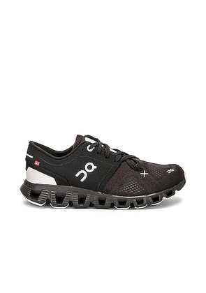 On Cloud X 3 Sneaker in Black - Black. Size 5 (also in 6).