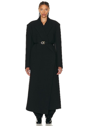 The Row Dhani Coat in Black - Black. Size M (also in L, S).