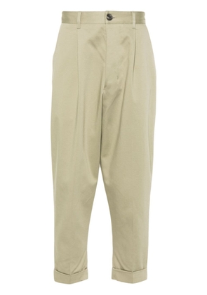 AMI Paris pressed-crease tapered trousers - Green