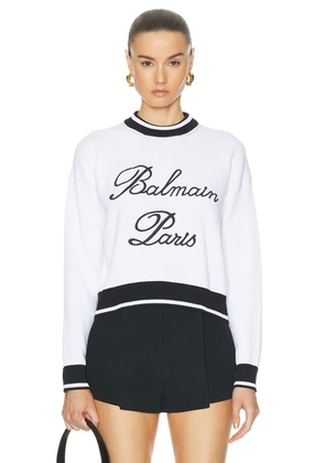 BALMAIN Logo Signature Pullover Sweatshirt in Blanc & Noir - Black. Size 34 (also in 36, 38, 40).