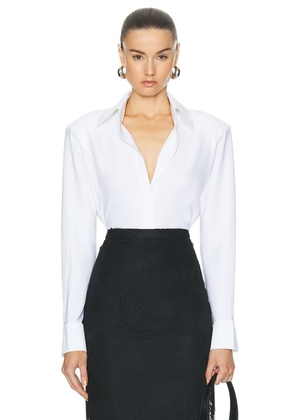 Norma Kamali Shoulder Pad Shirt in Snow White - White. Size L (also in M, S, XS).