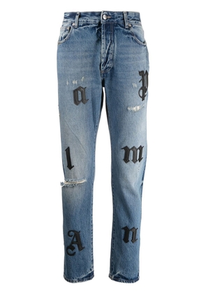 Palm Angels letter-embellished skinny jeans - Blue