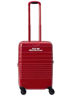BEIS The Carry-on Roller in Red.
