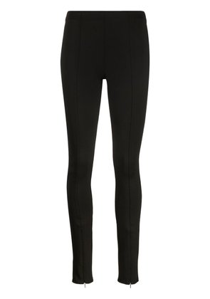 Calvin Klein logo-embroidered cuff-zip leggings - Black