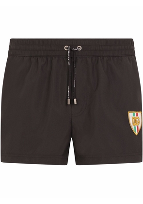 Dolce & Gabbana side-stripe logo swimming shorts - Black