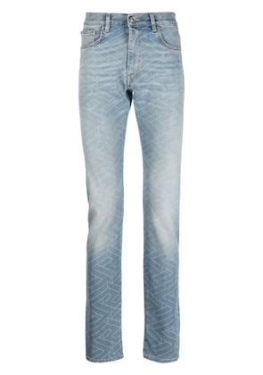 Versace geometric-print washed jeans - Blue