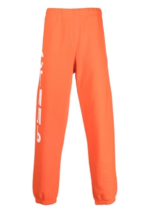 Heron Preston logo-print track pants - Orange