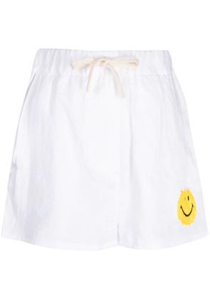 Joshua Sanders Smiley-embroidered linen shorts - White