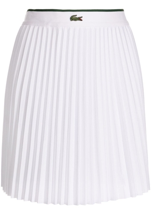 Lacoste logo-embroidered elasticated pleated miniskirt - White