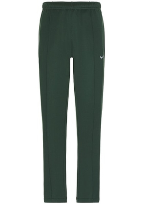 Museum of Peace and Quiet Warm Up Track Pant in Forest - Green. Size L (also in M, S, XL/1X, XS).