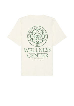 Museum of Peace and Quiet Wellness Center T-Shirt in Cream. Size S, XL/1X, XS.