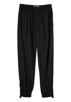 Song For The Mute logo-patch tapered-leg trousers - Black