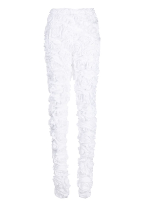 Comme Des Garçons floral-appliqué textured-finish trousers - White