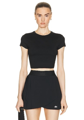 alo Soft Crop Finesse Short Sleeve Top in Black - Black. Size L (also in ).