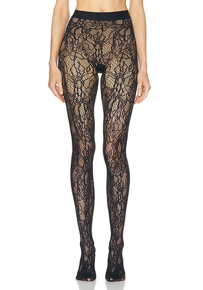 Wolford Floral Net Tights in Black - Black. Size L (also in M, S, XS).