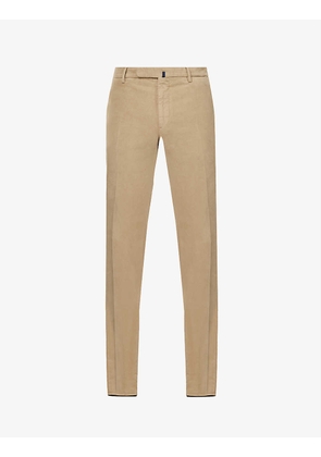Brand-plaque pressed-crease slim-fit tapered stretch-cotton trousers