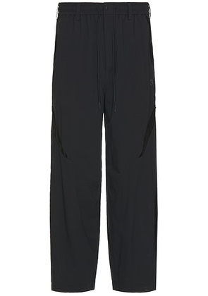 Y-3 Yohji Yamamoto Nyl Pants in Black - Black. Size L (also in M, S, XL/1X).