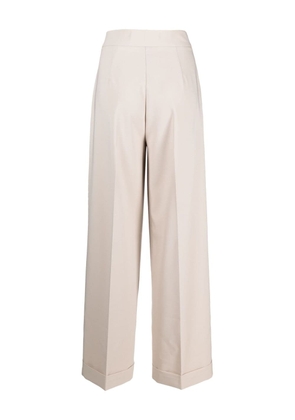 D.Exterior pressed-crease flared trousers - Neutrals