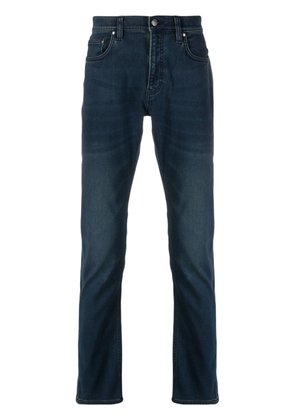 Michael Kors Collection mid-rise tapered-leg jeans - Blue