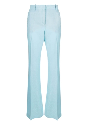 Versace Allover-jacquard flared wool trousers - Blue