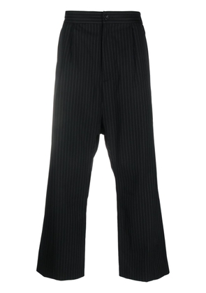 Attachment pinstripe-print drop-crotch trousers - Black