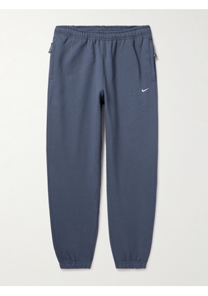 Nike - Solo Swoosh Tapered Logo-Embroidered Cotton-Blend Jersey Sweatpants - Men - Blue - M