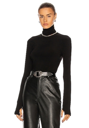 Norma Kamali Slim Fit Long Sleeve Turtleneck Top in Black - Black. Size L (also in M, S, XS).