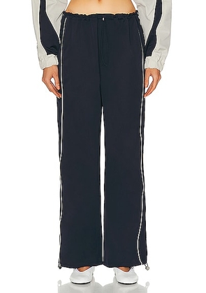 GRLFRND Cinched Waist Wide Leg Pant in Navy & Ivory - Navy. Size M (also in XL, XS, XXS).