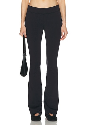 alo Airbrush Low-rise Bootcut Legging in Black - Black. Size L (also in M, S, XS).
