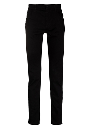 Dolce & Gabbana logo-patch slim-fit jeans - Black