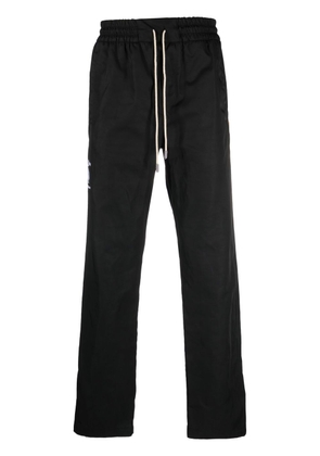Just Don logo-embroidered track pants - Black