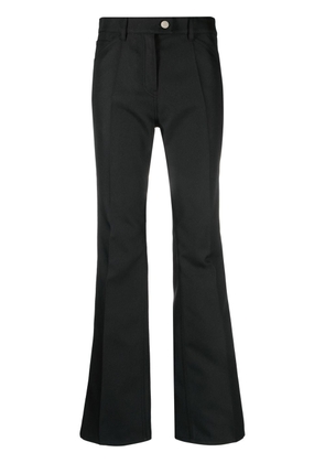 Courrèges logo-embroidered bootcut trousers - Black