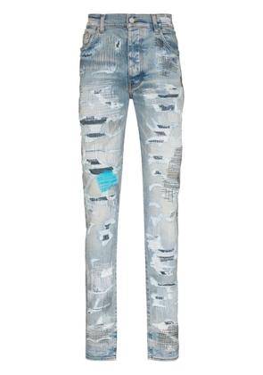 AMIRI distressed-finish skinny jeans - Blue
