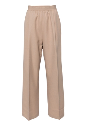 Stockholm Surfboard Club pressed-crease straight trousers - Neutrals