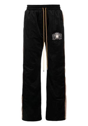 RHUDE crest-embroidered velvet track pants - Black
